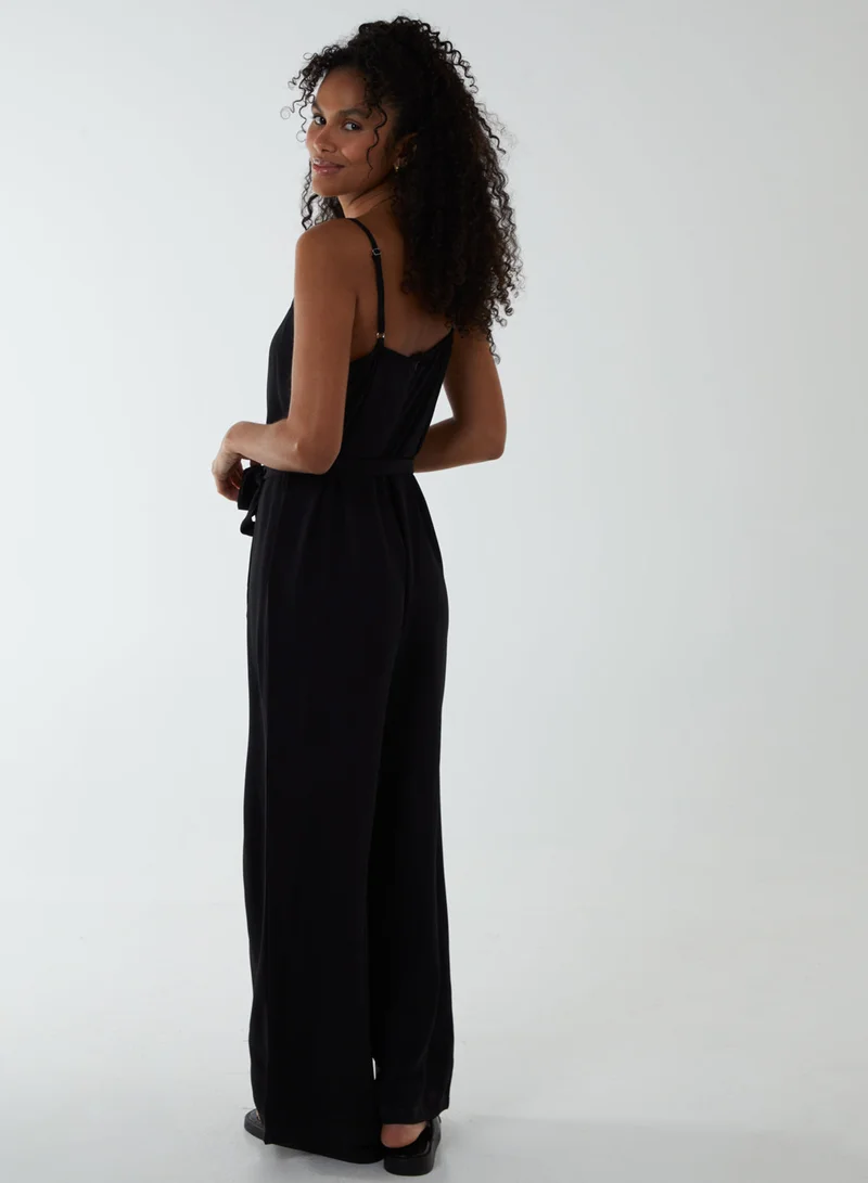 بلو فانيلا Button Front Strappy Jumpsuit